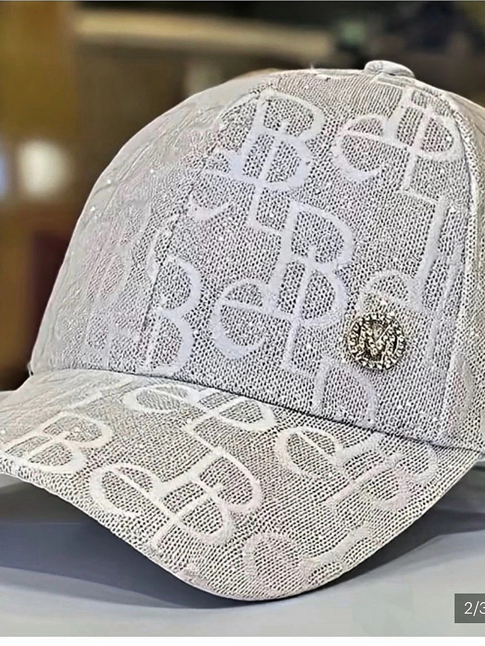All-Over Monogram Glitter Baseball Cap Cream New
Without tags.